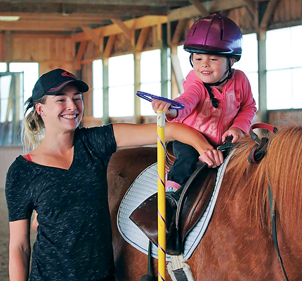 Andrea D. Gow of CanTRA, importance of communication skills in a therapeutic riding arena, augmentative and alternative communication for horse riders, horse riding communication skills
