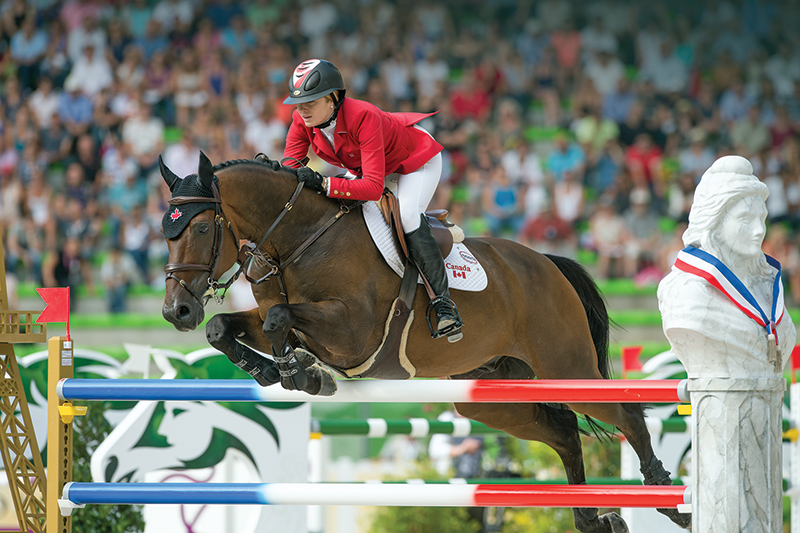 tiffany foster verdi III at world equestrian games, shutter speed 1/1250, how to photograph horses, horse photography in motion, action photography horses, equine action photography, photography at horse events, photo of horse using phone, take best horse photos, how to take a conformation photo of horse, make horse look good in photo, shawn hamilton