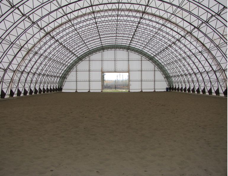 horse riding arena, indoor horse riding arenas, building horse riding arena, we cover, dutchmasters, ironwood building systems, fabric covered horse riding arena, wood post frame horse riding arena, lindsay day remt, steel frame horse riding arena, pre-engineered horse riding arenas, pre-built horse riding arenas, horse arena footing, pdi lasergrade, horse riding arena permit